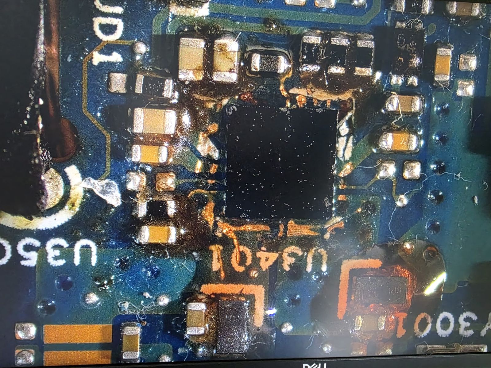 Motherboard chip repair close-up